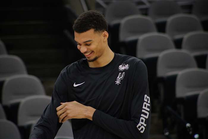 Jan 4, 2024; San Antonio, Texas, USA; San Antonio Spurs rookie Victor Wembanyama (1) smiles while listening to fans sing him 'Happy Birthday' prior to facing the Milwaukee Bucks.